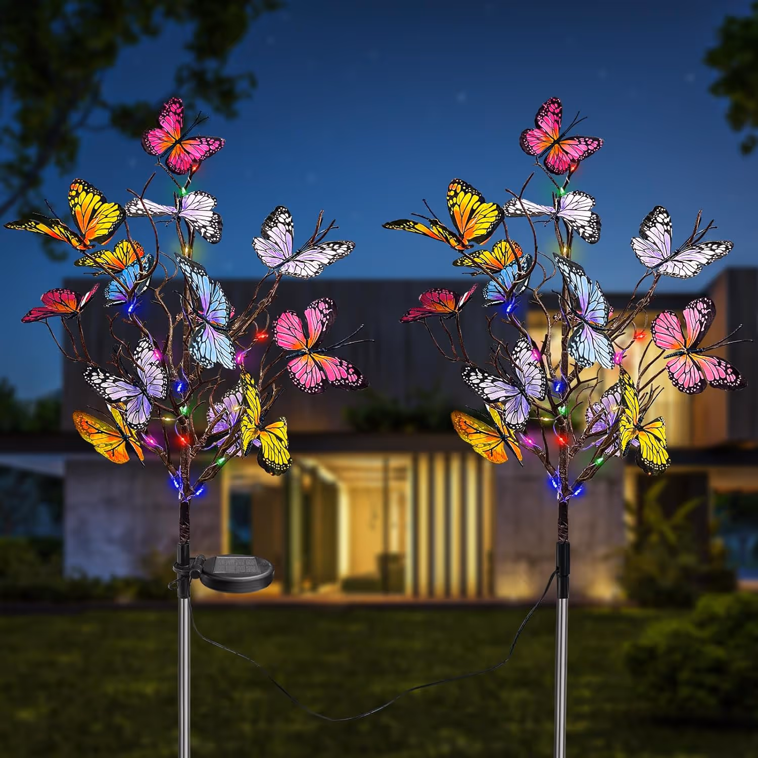 Solar Butterfly Lights in a garden at dusk